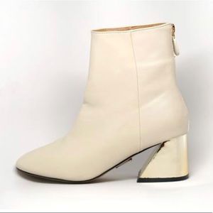 Gold heel ankle bootie